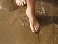 Sonya Ash In A Little Black String Bikini!