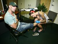 Emily Parker Gives A Guy A Tattoo And Some Pussy!