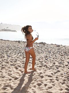 Nora Sibiel Really Likes Her New String Bikini!