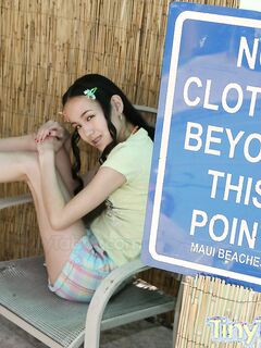 Amai Liu Strips Naked At The Bar!