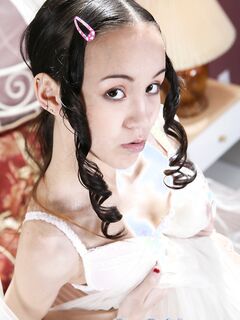 Amai Liu Does A Kinky Strip Tease!