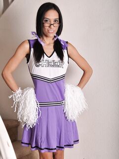 Tia Cyrus Takes Off Her Cheerleader Uniform!